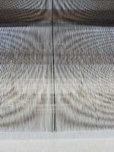 Wrong drawn-in defect in fabric formation zone