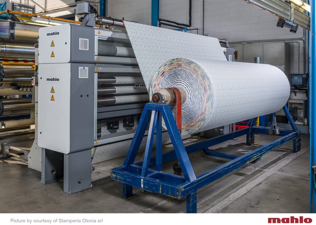 Orthopac RVMC-15: The classic weft straightener integrated in a textile production line.