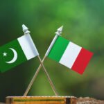 Italy,And,Pakistan,Flag,With,Blur,Green,Background